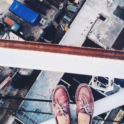 Low section of person standing on building terrace