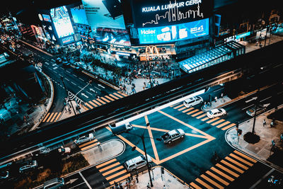 High angle view of illuminated city at night