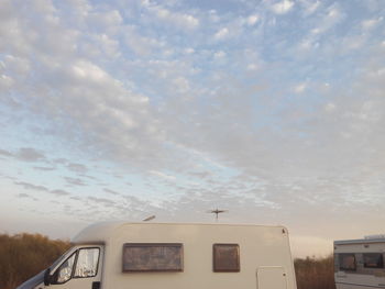 Low angle view of car against sky