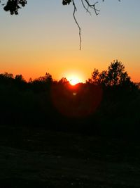 Scenic view of silhouette trees against sky during sunset