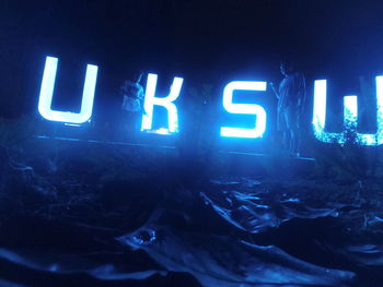 Close-up of text at night