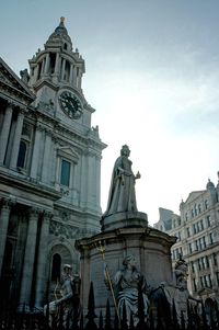 Low angle view of statue against sky