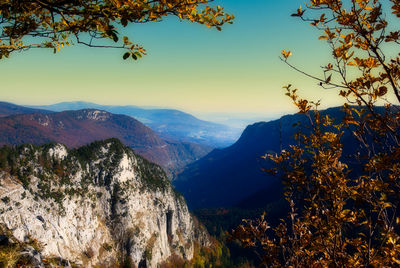 Scenic view of mountains against sky during sunset