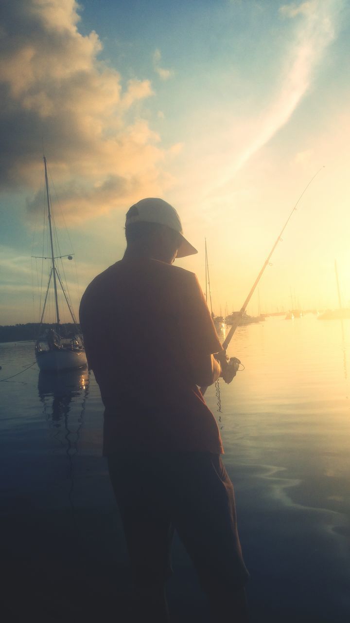 water, sky, sunset, nautical vessel, lifestyles, men, leisure activity, sea, lake, nature, boat, rear view, cloud - sky, tranquility, transportation, silhouette, beauty in nature, mode of transport