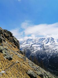 Scenic view of snowcapped mountains against sky