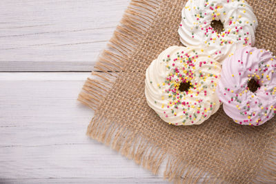 High angle view of donuts on table