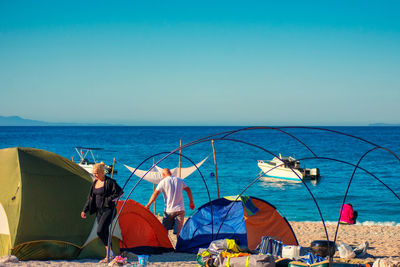 Scenic view of sea against clear blue sky