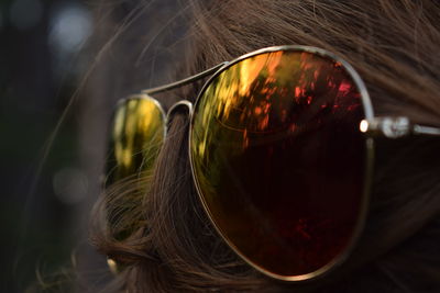 Close-up of woman wearing sunglasses