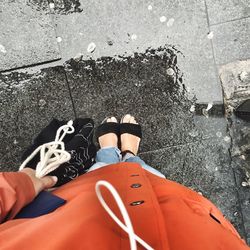 High angle view of people standing on road