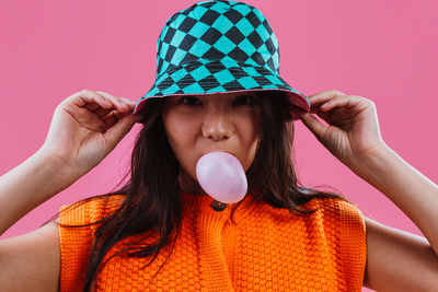 Close-up of woman holding heart shape