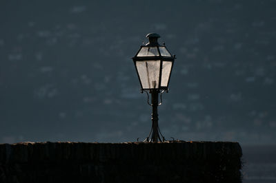 Close-up of street light against sky