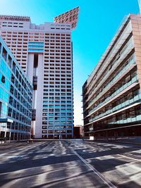 Low angle view of modern buildings against clear sky