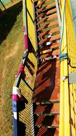 High angle view of yellow metal structure on sunny day