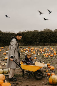 Rear view of man standing on field