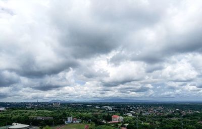 Scenic view of residential district against sky