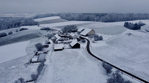 High angle view of snow covered landscape against sky