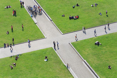 High angle view of people playing soccer field