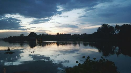 View of lake against cloudy sky