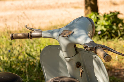 Close-up of bicycle on field