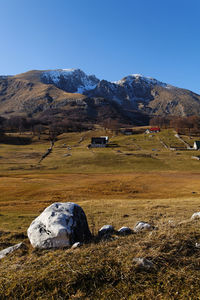 View of a field with mountain in the background