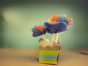 Close-up of flower vase on table