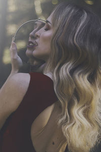 Portrait of a young woman looking away