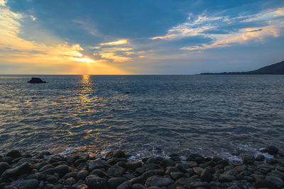 Scenic view of sea against sky during sunset