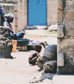 Man working on wall