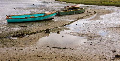 High angle view of boats moored on shore