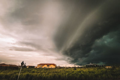 Scenic view of dramatic sky over land