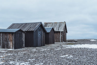 House on field against sky