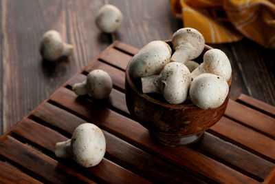 High angle view of mushrooms in bowl on table