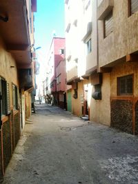 Narrow alley along buildings