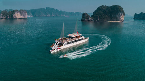 High angle view of ship sailing in sea