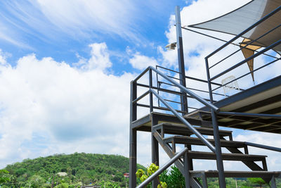 Low angle view of staircase against sky