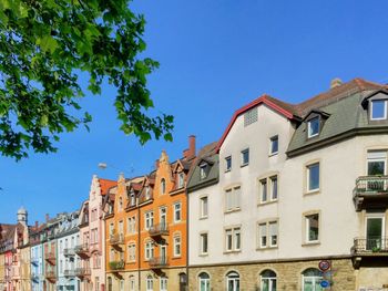 Townhouses in row on sunny day