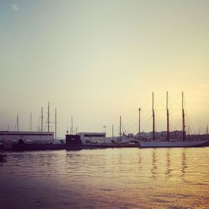 Boats moored at harbor