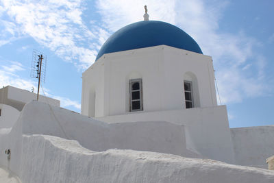 Low angle view of white building against sky