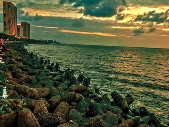 Scenic view of sea against sky at sunset