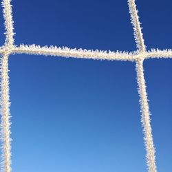 Vapor trail against clear blue sky