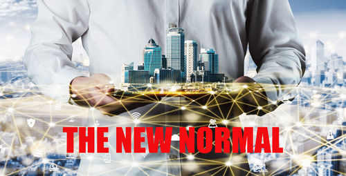 Digital composite image of man and woman standing against wall