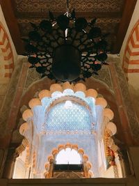 Low angle view of ornate ceiling in historic building