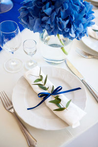 Wedding blue decorations on the table and lavender