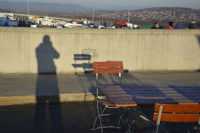 Shadow of people on bus