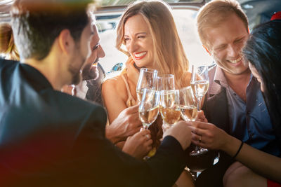  friends toasting with champagne 