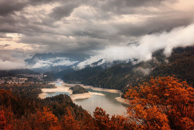 Scenic view of lake against sky during autumn