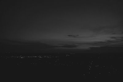 Scenic view of landscape against sky at night