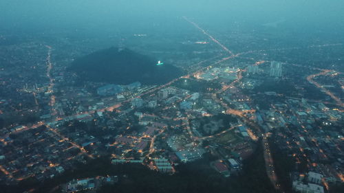 High angle view of buildings by sea