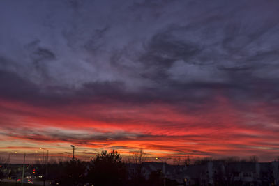 Scenic view of dramatic sky at sunset