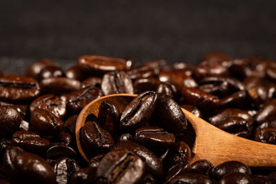 Close-up of coffee beans on table